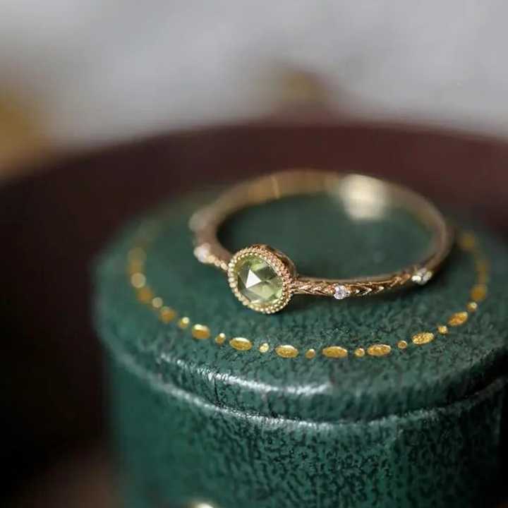 Opinie Srebrny pierścionek z Peridotem i diamentami - delikatna biż… sklep online